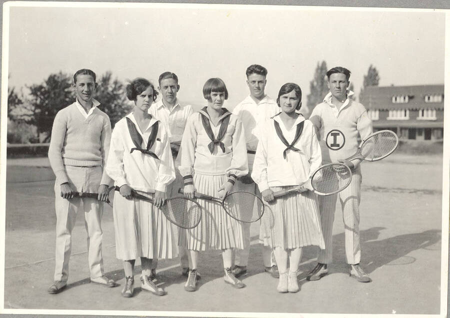 The 1926 Idaho Tennis team poses near Campus Drive for its group photograph.