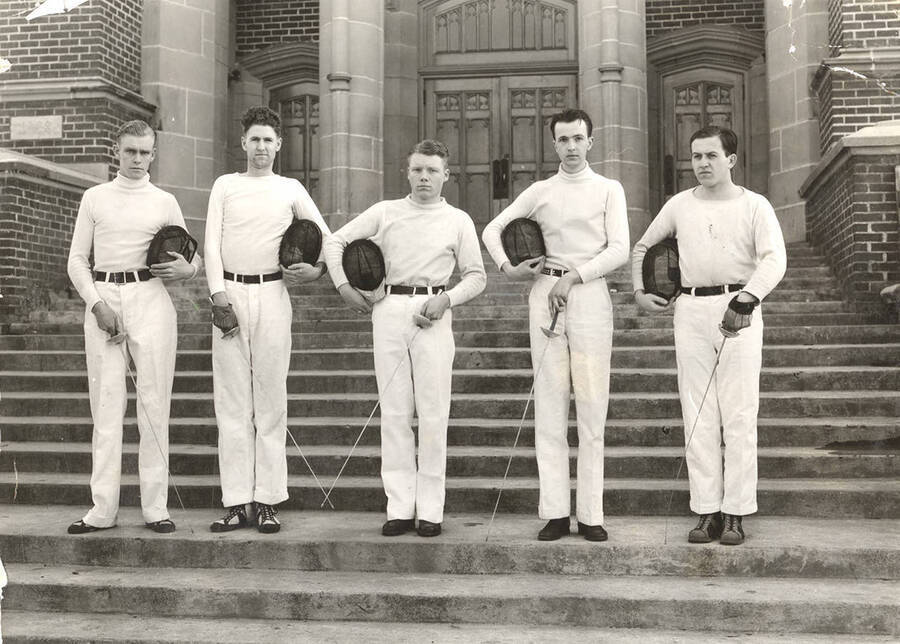 The 1935 Idaho men's Fencing club poses on the steps of Memorial Gymnasium for a group photograph.