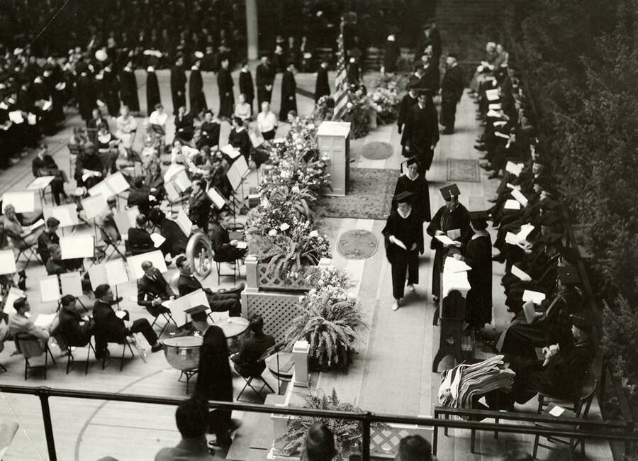 The granting of degrees to students during the  1936 Commencement ceremony.