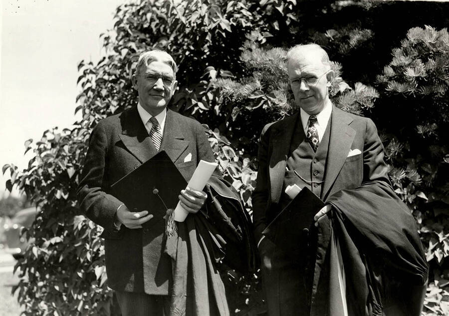 Dr. Albert W. Beaven, the 1937 Commencement speaker, and Dean Kerr stand together outdoors for Commencement.