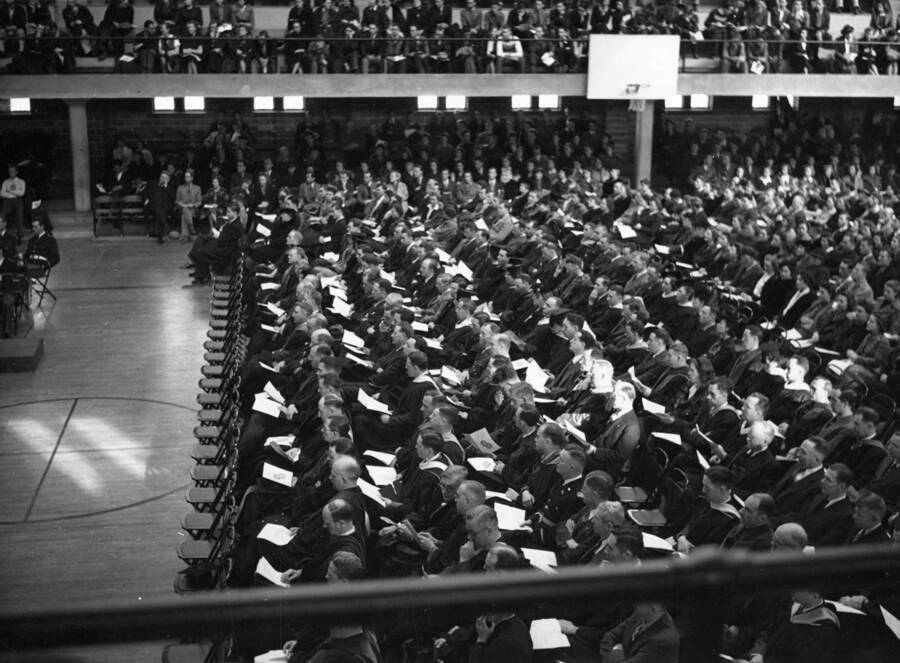 Faculty members and the audience seated during the Commencement ceremony. From files of C.J. Brosnan