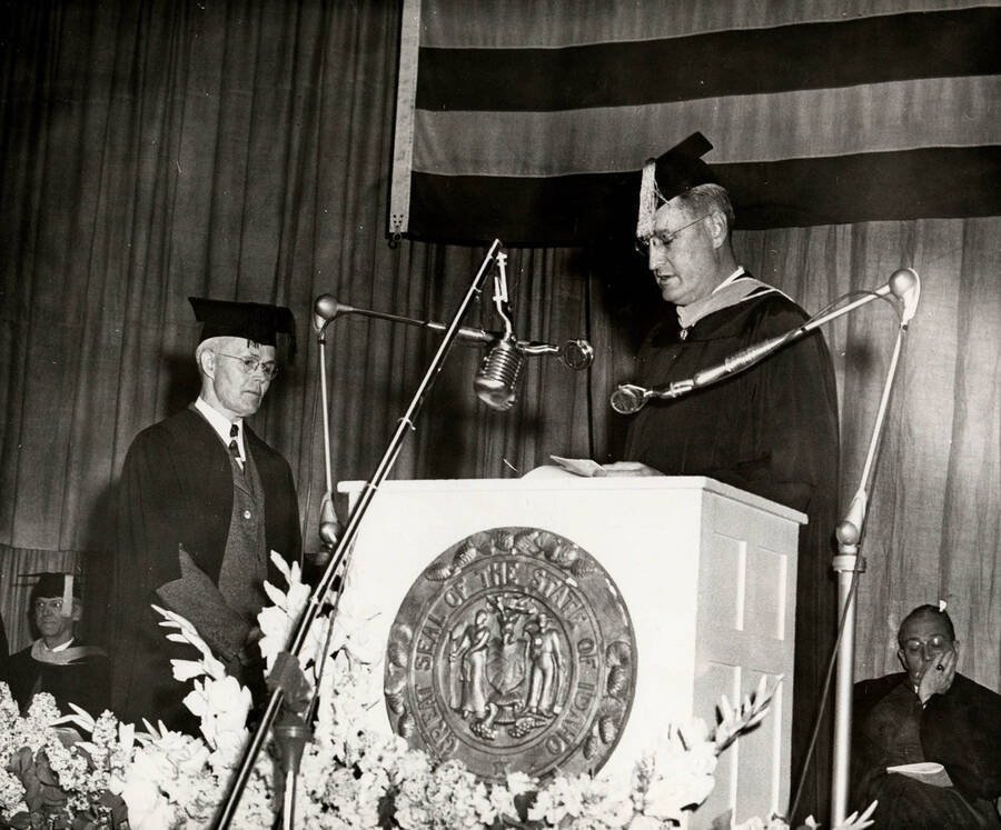 Professor Eugene Taylor receiving a citation upon retirement during the 1950 Commencement ceremony.