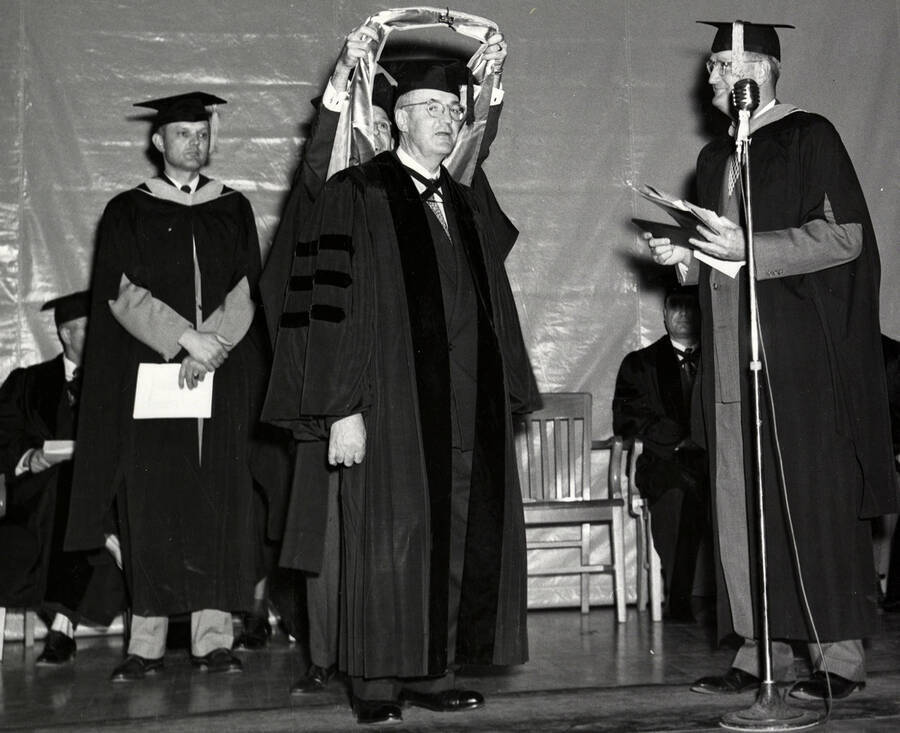 James B. Hays receiving an honorary degree from University of Idaho President Jesse Buchanan during the 1953 Commencement ceremony.