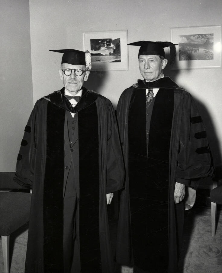 Laurence Gipson and Carol Howe Foster, Idaho's first two Rhodes scholars, receiving Doctorate degrees during the 1953 Commencement ceremony.