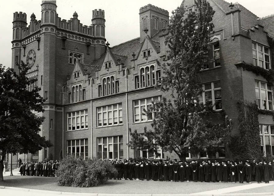 Academic procession standing in front of the Administration Building during the 1939 Commencement ceremony.