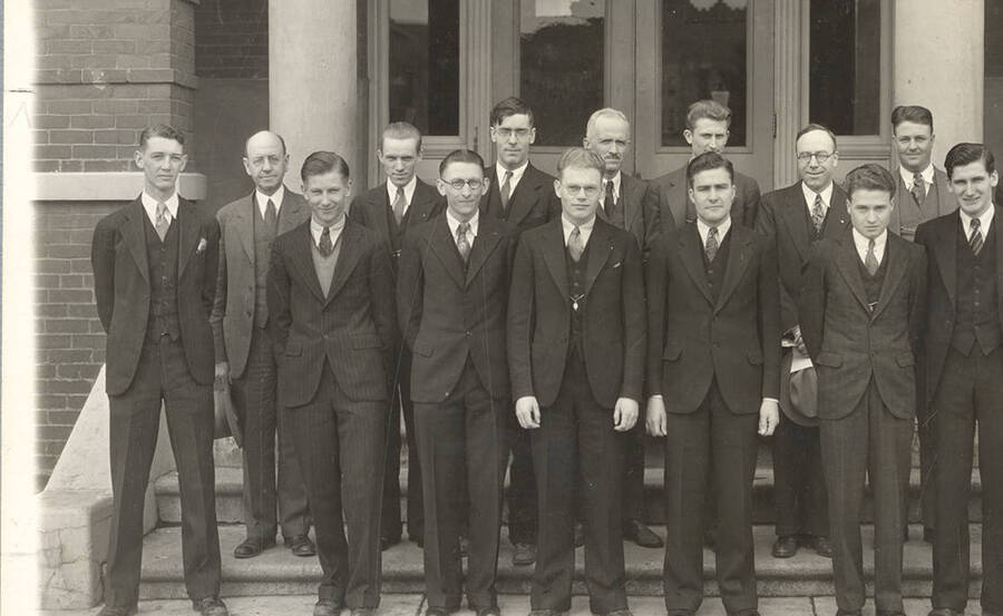 Members of Xi Sigma Pi, the national honorary forestry fraternity, stand for a group photo in front of Morill Hall.