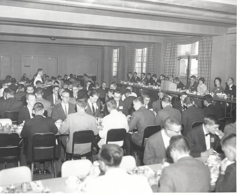 Attendees of the 37th National Convention of the Intercollegiate Knights, a national honorary service organization, gather for a closing day banquet in the Student Union Building ballroom.