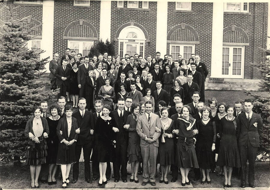 Students pose for a photograph outside of Kappa Sigma before the spring formal.
