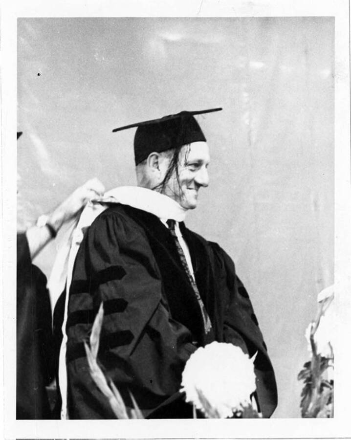 William F. Johnston receiving an honorary Doctorate degree during the 1966 Commencement ceremony.