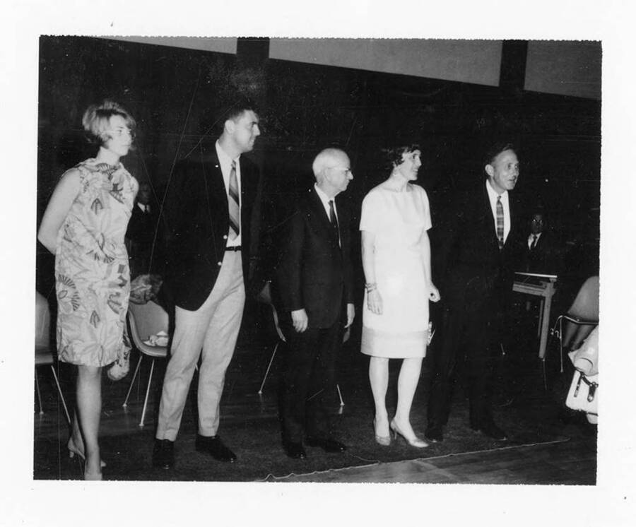 The receiving line for the President's reception for graduating seniors. Left to right: Susan M. Daniels, Steven D. Oliver, Dr. H. Walter Steffens, Mrs. Ernest W. Hartung, and President Ernest W. Hartung.