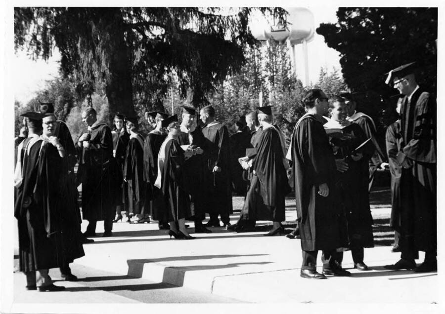 Graduates gather outside the Memorial Gymnasium before the 1969 Commencement ceremonies.