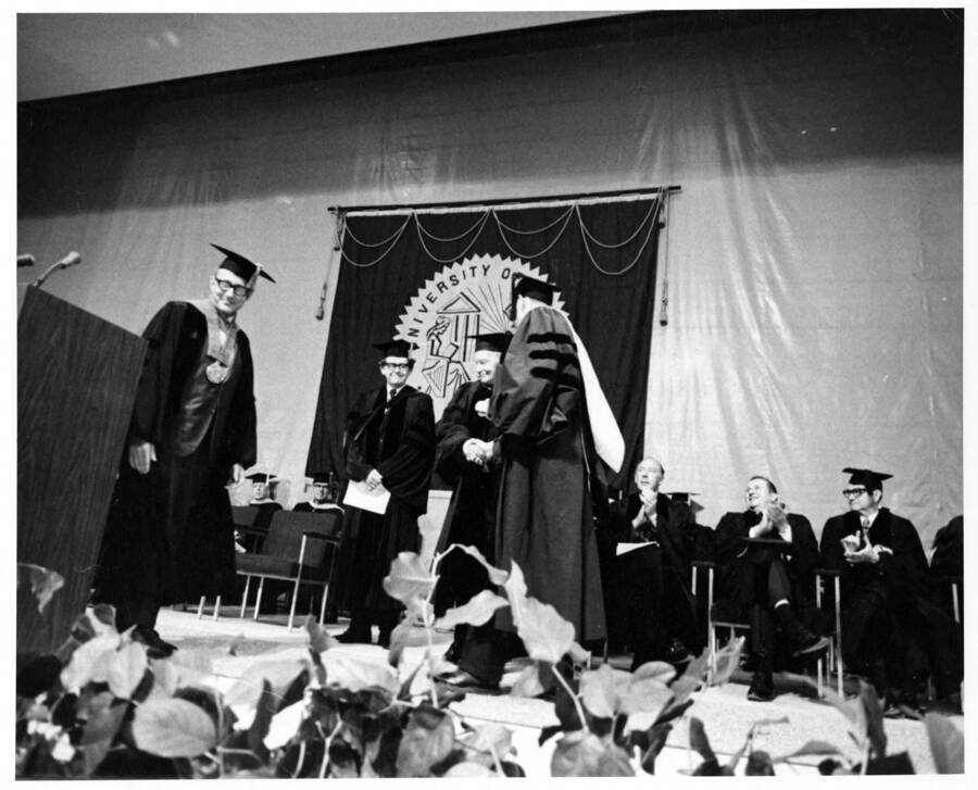 Lester J. Randall receiving an honorary Doctor of Administrative Science degree during the 1971 Commencement ceremony.