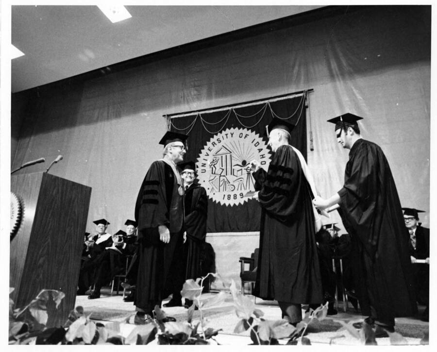 Louis DeSpain receiving an honorary Doctor of Science degree during the 1971 Commencement ceremony.