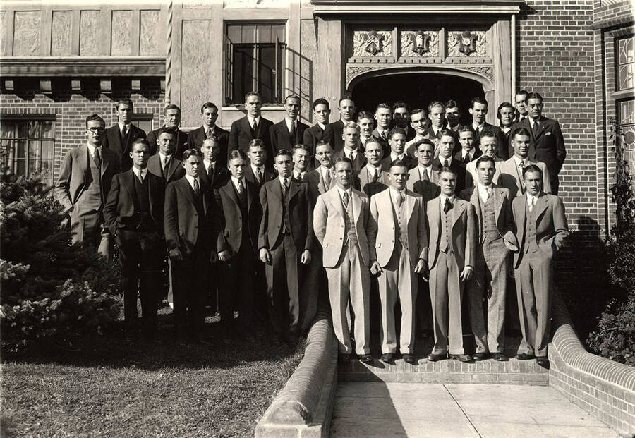 Members of Phi Gamma Delta pose for a group photograph outside of the Phi Gamma Delta house.