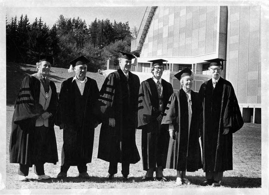Honorary degree recipients with President Ernest W. Hartung for the 1976 Commencement. From left: Dr. Ernest W. Hartung, Arthur Troutner, Governor Cecil Andrus, John Corlett, Verna Johanneson Hitchcock, Dr. Malcolm M. Renfrew.