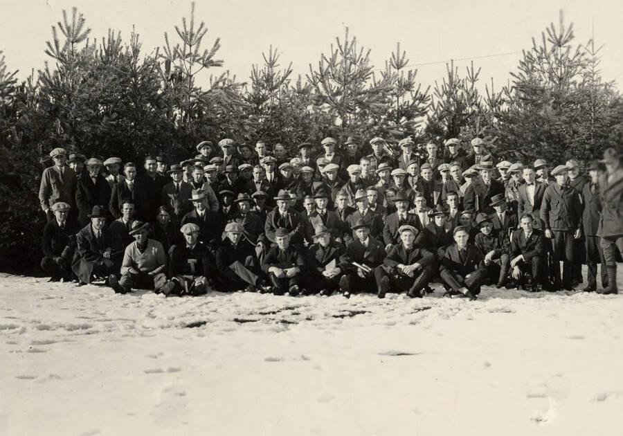 A formal group portrait of the Associated Foresters taken during the winter.