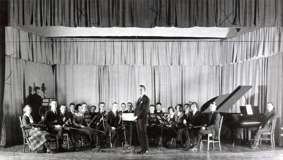 A group picture of the University Orchestra of 1922-1923, under the direction of Professor Carl Claus.