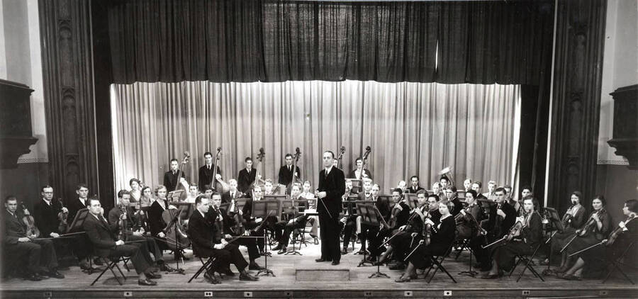 A group picture of the University Orchestra of 1932-1933, under the direction of Professor Carl Claus.