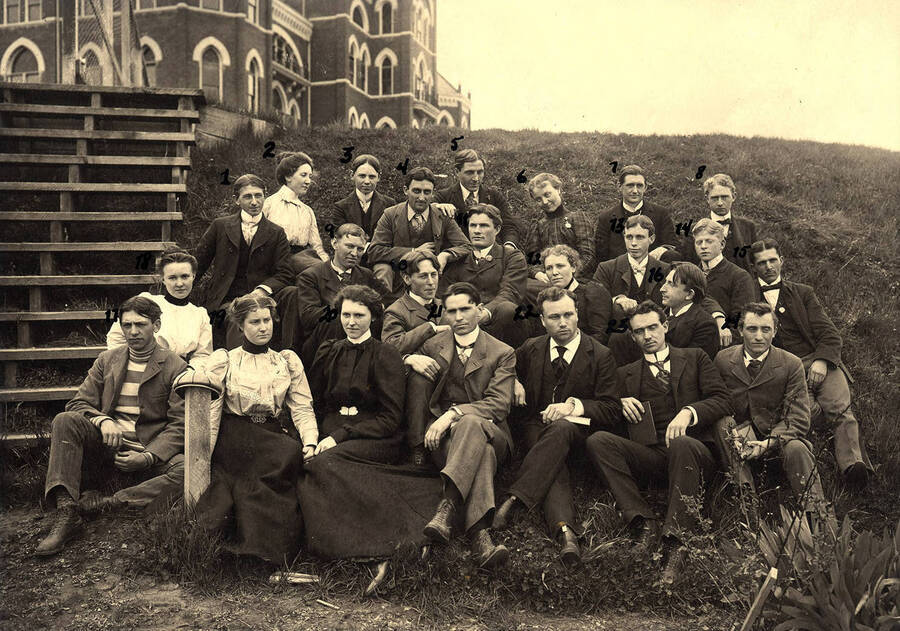The graduating class of 1901 poses together near the stairs to the original Administration Building. Individuals identified on mount.