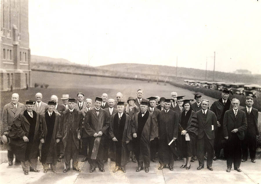 Members of the class of 1901 participate in the 1941 Commencement ceremonies wearing their academic regalia.