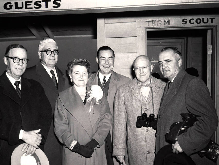 Federal and state dignitaries stop for a photo before attending homecoming activities at the Univeristy of Idaho. Pictured left to right: A.B. Guthrie, U.S. Senator Henry Dworshak, U.S. Representative Gracie Pfost, Governor Robert E. Smylie, University of Idaho President Donald Theophilus, and U.S. Senator Herman Welker. University of Idaho.