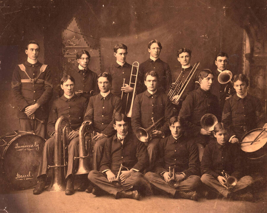The University Band sits for a formal portrait that was then featured in the Gem of the Mountains Yearbook for 1903. Back: Charles Reed, Frederick Ruble, Harlie Innis, H.C. Tilley, Norris Pollard, F.E. Montandon; center: C.E. Bolles, Anthony VanHarten, W.C. Turley, F.B. Costello, R.W. Fisher; front: J.H. Miller, G.E. Horton, A.K. Carlson