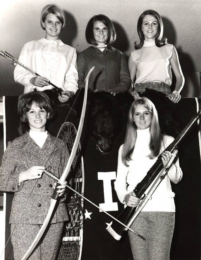 Homecoming queen finalists, Shirlie Vorous, Madeline Meltvedt, Margery Nobles, Emily Christie, and Betty Westerberg, pose for a photo together. Sally Armstrong received the crown.