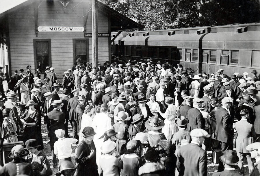 New and returning students cluster at the Moscow train station as the Student Special train arrives from southern Idaho.