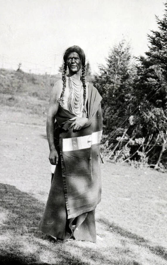 An unidentified man poses in traditional Native American clothing for the Light on the Mountains pageant.
