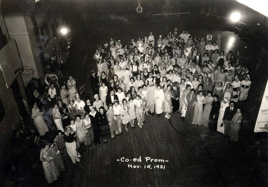 Students attending the Co-ed Prom pose together for an overhead photograph. Caption reads: "Co-ed Prom Nov. 14, 1931."