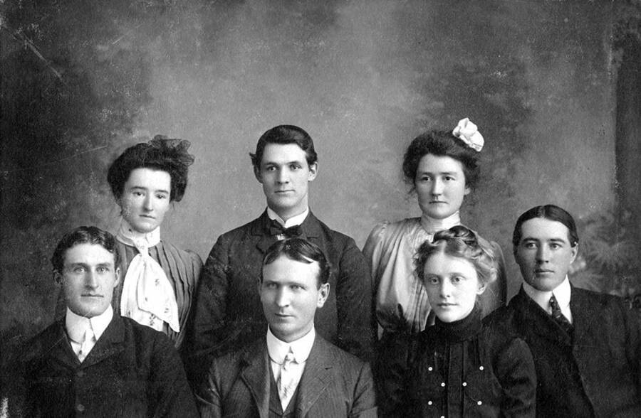 Staff members of the Idaho Argonaut pose for a picture. Students pictured: Front row left to right: Fred H. McConnell, Henry Lancaster, Fern Hadley, Jack McCloud. Back row left to right: Zella Perkins, Pete Orcutt, Marie Cuddy.