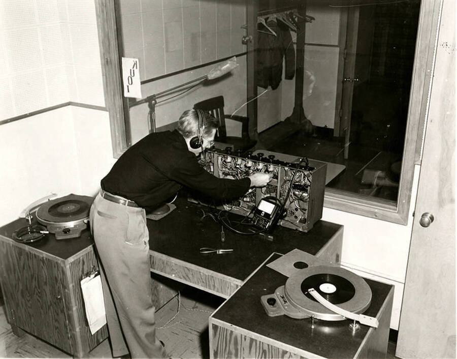 An unidentified man works on a transmitter in KUOI, Idaho's student-run radio station.
