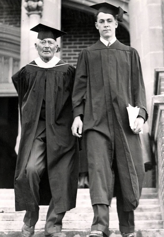 Morton Brigham walks with his father university founder John Warren Brigham during Idaho's commencement. John Warren Brigham was a legislator from Genesee who introduced the bill founding the University.