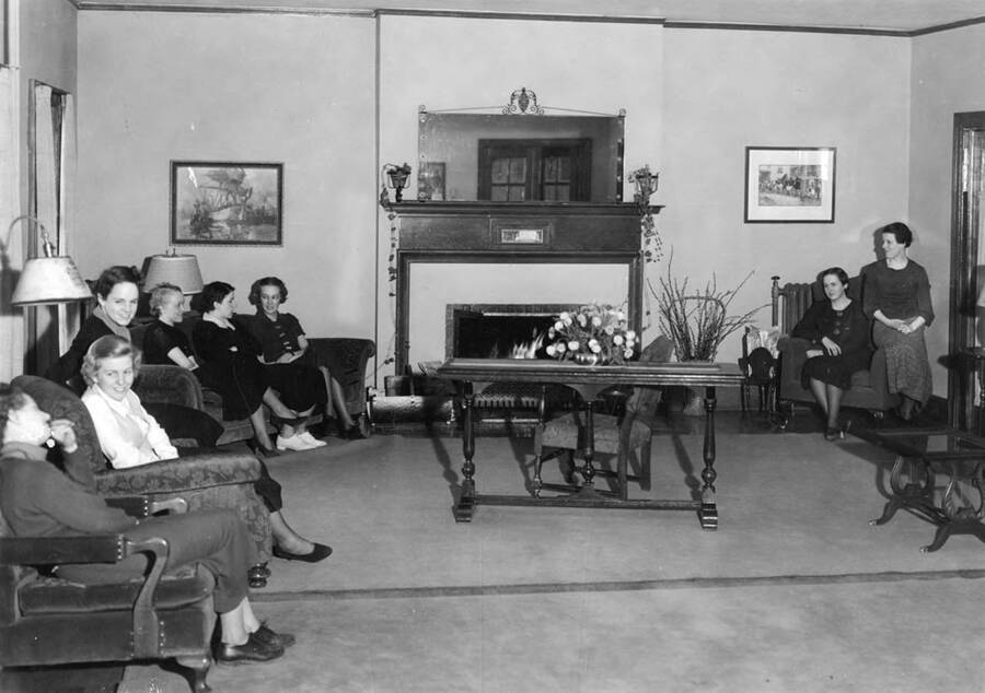 Women sit around the living room of the Kappa Kappa Gamma house on 805 Elm Street..