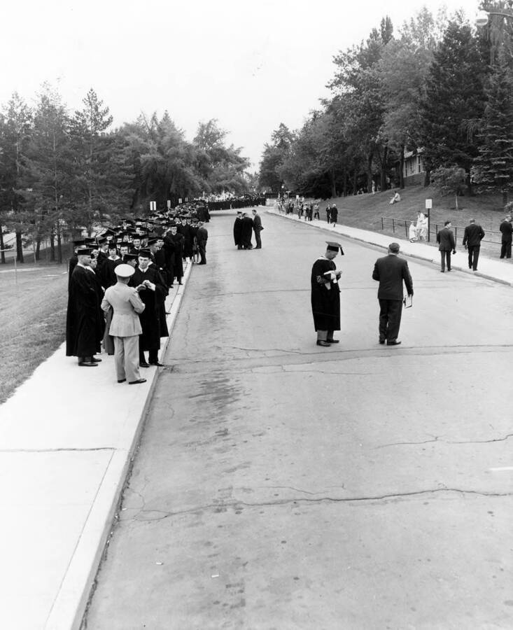 Students are placed into an orderly line prior to University of Idaho's commencement.