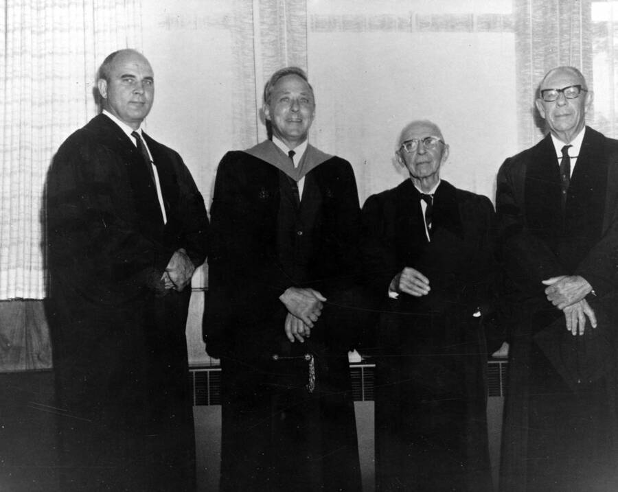University of Idaho honorary degree recipients pose together after Idaho's commencement. From left to right: Robert V. Hansberger, Benjamin W. Oppenheim, and Dr. Walter H. Pierce with University of Idaho President, Ernest W. Hartung.