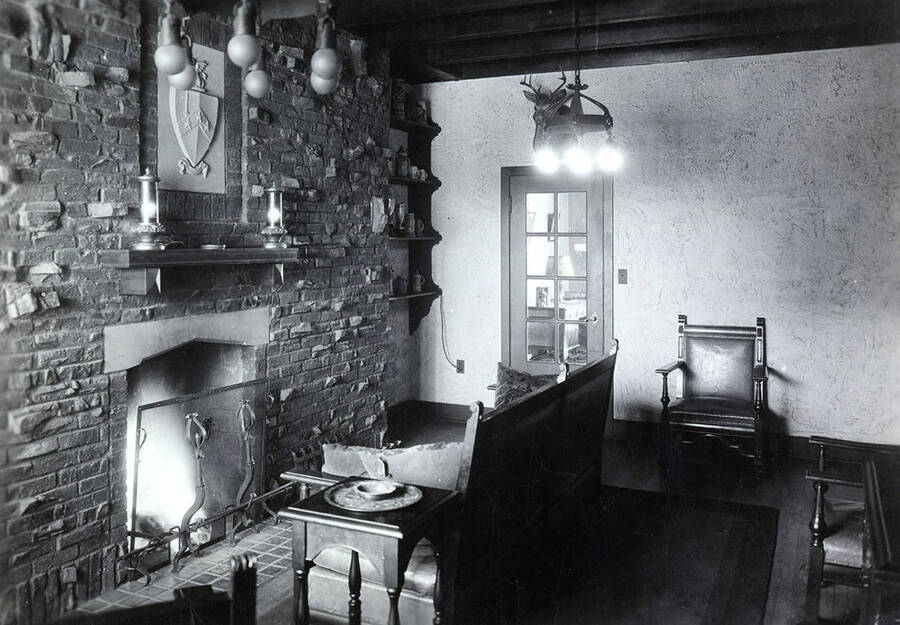 Interior view of the living room in the Beta Theta Pi house, which is located on the northwest corner of Idaho and Elm Streets.