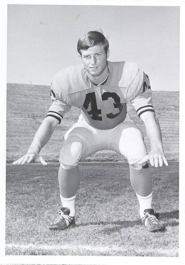 Linebacker Jim Boyles poses in his defensive stance.