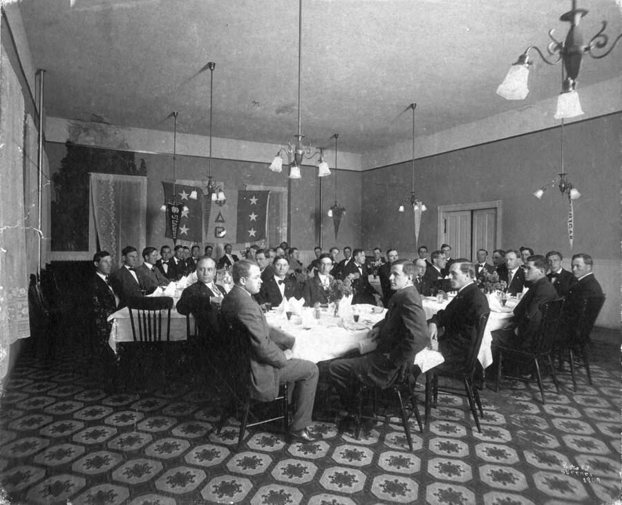 Phi Delta Theta founding dinner being held in Ridenbaugh Hall.