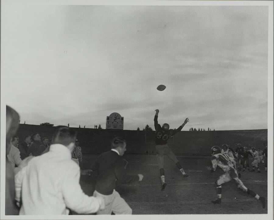 An Idaho defensive back jumps in an attempt to intercept an overthrown ball.