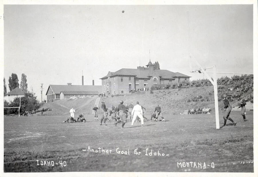 Photograph of the University of Idaho versus Montana football game. Caption reads 'Idaho-40 ~Another Goal For Idaho~ Montana-0.'
