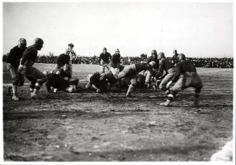 Photograph of the University of Idaho versus Utah football game. Score: Idaho-10, Utah-0.