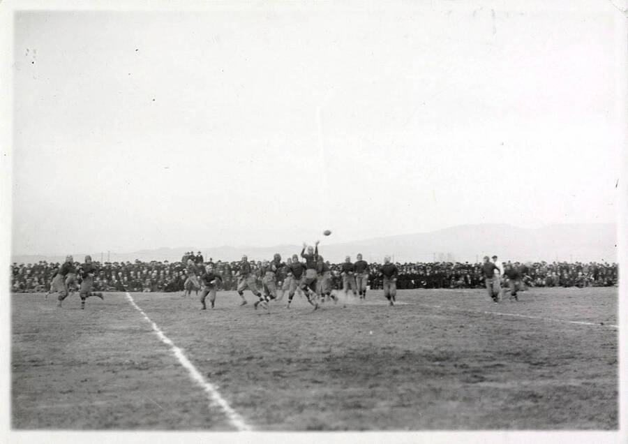 Photograph of the University of Idaho versus Utah football game. Score: Idaho-10, Utah-0.