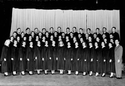 The Vandaleers stand for a photograph on the stairs to the Administration building.