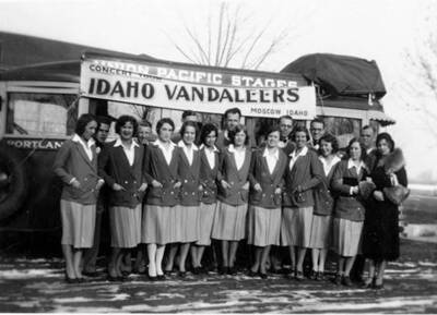 Vandaleers standing beside the Union Pacific Stage (front says Portland).
