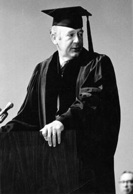 Governor Cecil Andrus addresses the graduates and crowd during University of Idaho's commencement. He also received as honorary Doctor of Laws degree.