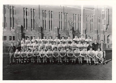 The Vandal varsity football team in front of the Memorial Gym on the University of Idaho Moscow campus.