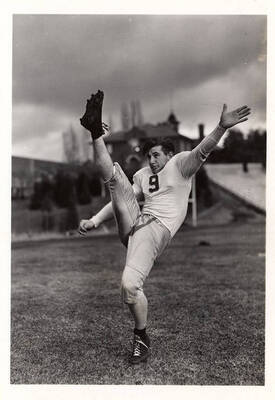 Freshman football player for the University of Idaho Del Owens at the peak of his kick.