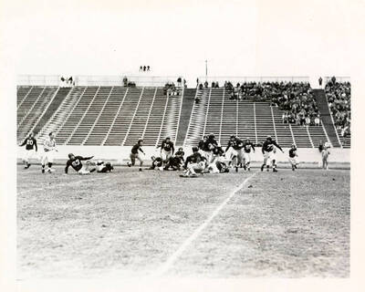 The aftermath of a tackle during the University of Idaho and Portland University football game that ended with a Vandal win 20-6.
