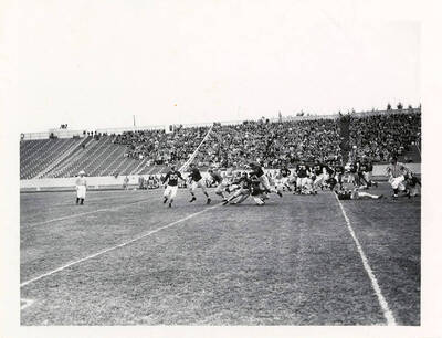 The beginning of a tackle during the University of Idaho and Portland University football game that ended with a Vandal win 20-6.